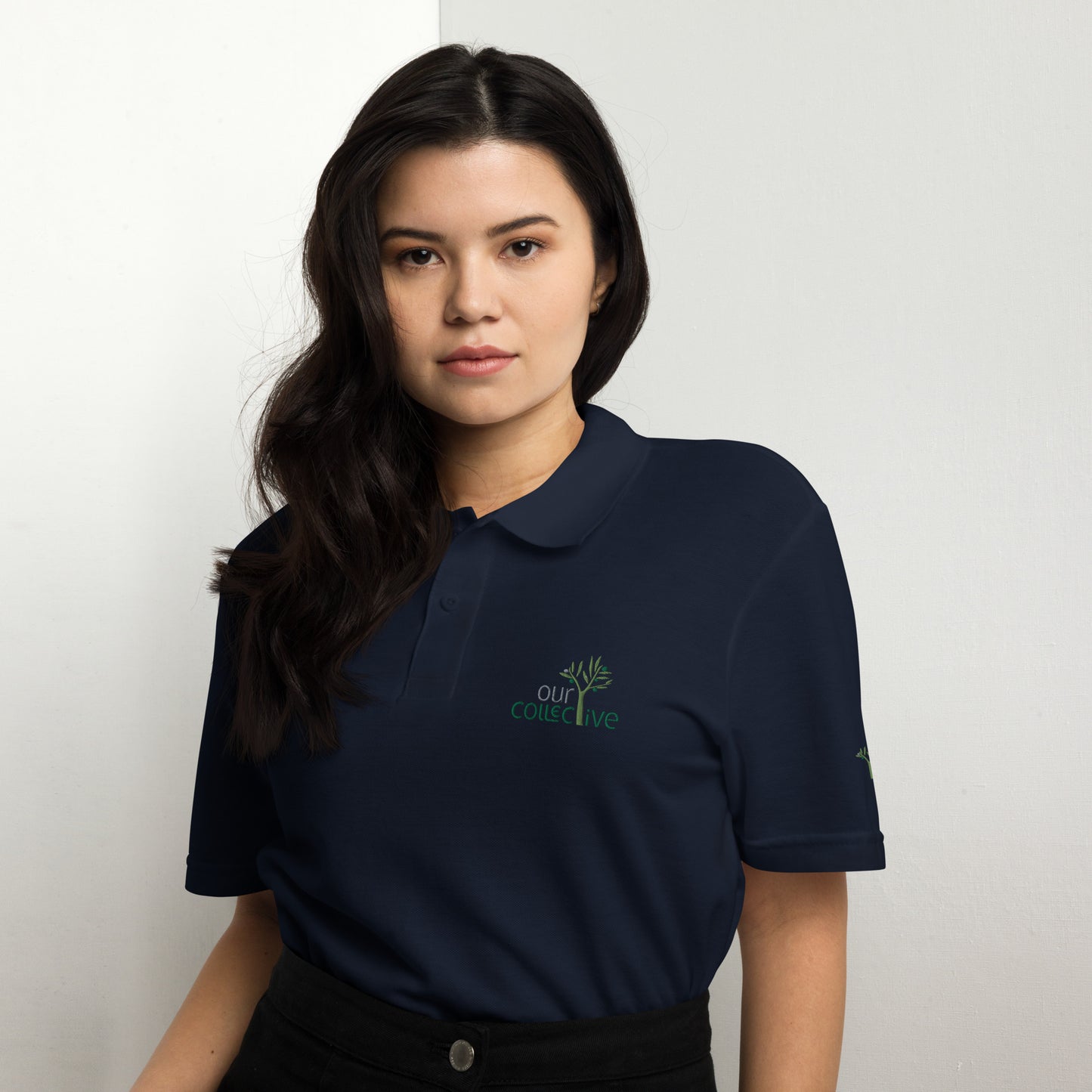 Our Collective deluxe Unisex Polo Shirt